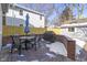 Charming backyard with brick patio, table, chairs, and grill at 4805 N Park Ave, Indianapolis, IN 46205