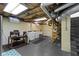 Bright basement featuring a laundry area and workspace at 4805 N Park Ave, Indianapolis, IN 46205