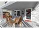 Inviting front porch with comfortable seating, perfect for relaxing and enjoying the neighborhood view at 4805 N Park Ave, Indianapolis, IN 46205