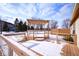 Backyard wooden deck with pergola, creates outdoor relaxation space at 4912 Eagle Talon Ct, Indianapolis, IN 46254