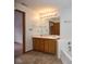 Bathroom featuring double sinks, bathtub, and a bright, clean aesthetic at 4912 Eagle Talon Ct, Indianapolis, IN 46254