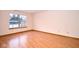 Bedroom boasts natural light, wood floors, and a serene setting at 4912 Eagle Talon Ct, Indianapolis, IN 46254