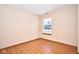 Bedroom featuring hardwood floors and a window to provide natural light at 4912 Eagle Talon Ct, Indianapolis, IN 46254