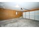 Spacious garage with white door and walls, providing secure parking and storage space at 4912 Eagle Talon Ct, Indianapolis, IN 46254