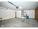 Open garage with access to house systems, offering parking and utilities at 4912 Eagle Talon Ct, Indianapolis, IN 46254