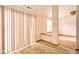 Bright living area leads to dining space, features neutral decor and large window at 4912 Eagle Talon Ct, Indianapolis, IN 46254