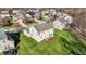 Aerial view of house shows deck and large yard, near other homes in a neighborhood at 5147 Nicodemus Dr, Plainfield, IN 46168