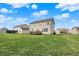 Home exterior features a spacious yard, perfect for outdoor activities and enjoyment at 5147 Nicodemus Dr, Plainfield, IN 46168