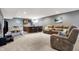 Spacious finished basement featuring a wet bar and comfortable seating at 5147 Nicodemus Dr, Plainfield, IN 46168