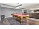 Basement game room with a classic pool table and bar area at 5147 Nicodemus Dr, Plainfield, IN 46168