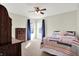 Bedroom with a bed, dresser, carpet, and natural light from the windows at 5147 Nicodemus Dr, Plainfield, IN 46168