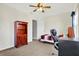 Bedroom featuring a ceiling fan, bookshelf, and neutral-colored walls at 5147 Nicodemus Dr, Plainfield, IN 46168