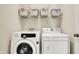 Convenient laundry room with modern washer and dryer at 5147 Nicodemus Dr, Plainfield, IN 46168