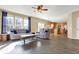 Bright living room featuring large windows, hardwood floors, and a comfortable seating area at 5147 Nicodemus Dr, Plainfield, IN 46168