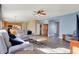 Spacious living room features comfortable seating and seamlessly connects to an open kitchen area at 5147 Nicodemus Dr, Plainfield, IN 46168
