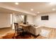 Finished basement featuring modern furnishings and stylish flooring with staircase access at 5715 N Delaware St, Indianapolis, IN 46220