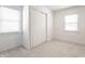 Bedroom with carpeted floors, natural light, and closet at 5715 N Delaware St, Indianapolis, IN 46220