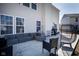 Relax on the spacious backyard patio with comfortable seating, perfect for outdoor entertaining and lounging at 6236 White Rabbit Pl, Indianapolis, IN 46235