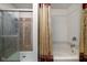 Bathroom featuring a glass enclosed shower and separate bathtub at 6236 White Rabbit Pl, Indianapolis, IN 46235