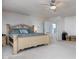 Spacious main bedroom with a ceiling fan and ample natural light at 6236 White Rabbit Pl, Indianapolis, IN 46235