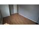 Bedroom with a closet, hardwood floors, and natural light at 624 Park Dr, Greenwood, IN 46143