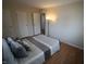 Bedroom featuring a queen bed and vinyl floors at 624 Park Dr, Greenwood, IN 46143