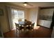 Eat-in kitchen featuring a round dining table and access to the outdoor space at 624 Park Dr, Greenwood, IN 46143