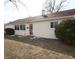 Charming home with manicured lawn, mature shrubbery and front entryway at 624 Park Dr, Greenwood, IN 46143