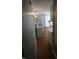 Efficient kitchen featuring white appliances, ample cabinet space, and hardwood floors at 624 Park Dr, Greenwood, IN 46143