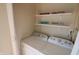 This laundry room is ready for use with washer and dryer already installed at 624 Park Dr, Greenwood, IN 46143