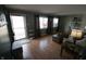 Bright living room with hardwood floors, modern décor, and a large sliding glass door at 624 Park Dr, Greenwood, IN 46143
