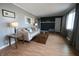 Comfortable living room featuring hardwood floors, modern décor, and a large window at 624 Park Dr, Greenwood, IN 46143