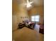 Bedroom with vaulted ceilings featuring modern decor and a large window at 6564 Aintree Pl, Indianapolis, IN 46250