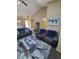 Open living room featuring vaulted ceilings, modern furniture and decor at 6564 Aintree Pl, Indianapolis, IN 46250