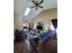 Open living room featuring vaulted ceilings, a skylight and comfortable furniture at 6564 Aintree Pl, Indianapolis, IN 46250