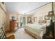 Serene bedroom with a four-poster bed, natural light, and a tranquil ambiance for restful nights at 7166 N Oak Ridge Rd, Morgantown, IN 46160