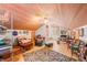 A spacious bonus room with wooden floors and a wooden ceiling at 7166 N Oak Ridge Rd, Morgantown, IN 46160