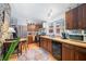 Functional kitchen featuring wood cabinets, essential appliances, and a cozy layout for everyday living at 7166 N Oak Ridge Rd, Morgantown, IN 46160