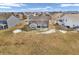Aerial view of a backyard featuring a patio set and lawn at 976 Cherry Tree Ln, Greenwood, IN 46143