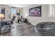 This bedroom features a Peloton bike, weights, and a comfortable seating area at 976 Cherry Tree Ln, Greenwood, IN 46143