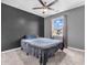 This bedroom features a bed, carpeted floors and a window with natural light at 976 Cherry Tree Ln, Greenwood, IN 46143