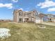 Charming, two-story house with a three-car garage and a beautifully landscaped front yard at 976 Cherry Tree Ln, Greenwood, IN 46143