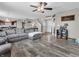 Inviting living room with an open floor plan, comfortable seating, and seamless access to other living spaces at 976 Cherry Tree Ln, Greenwood, IN 46143