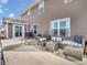 Outdoor patio featuring stylish wicker furniture, a grill, and space for entertaining at 976 Cherry Tree Ln, Greenwood, IN 46143