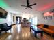 Inviting living room showcasing an open floor plan, kitchen island, and stylish furniture at 1046 Nelson Ave, Indianapolis, IN 46203