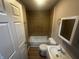 Well-lit bathroom featuring a tub-shower combination and a modern vanity at 1105 Winfield Ave, Indianapolis, IN 46222