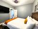 Comfortable bedroom featuring a large bed and neutral decor at 1328 E Minnesota St, Indianapolis, IN 46203