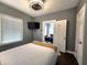 Bedroom featuring an open doorway to the living area at 1328 E Minnesota St, Indianapolis, IN 46203