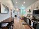 Open-concept living and dining area with stylish furnishings and decor at 1328 E Minnesota St, Indianapolis, IN 46203