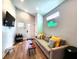 Inviting living room features modern decor, wood floors, stylish furniture, and a bright, airy atmosphere at 1328 E Minnesota St, Indianapolis, IN 46203